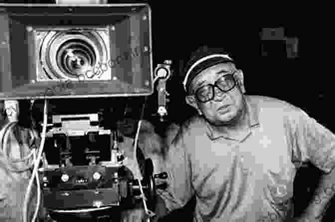 A Black And White Photograph Of Akira Kurosawa, A Japanese Filmmaker, Sitting At A Desk And Writing. Something Like An Autobiography Akira Kurosawa