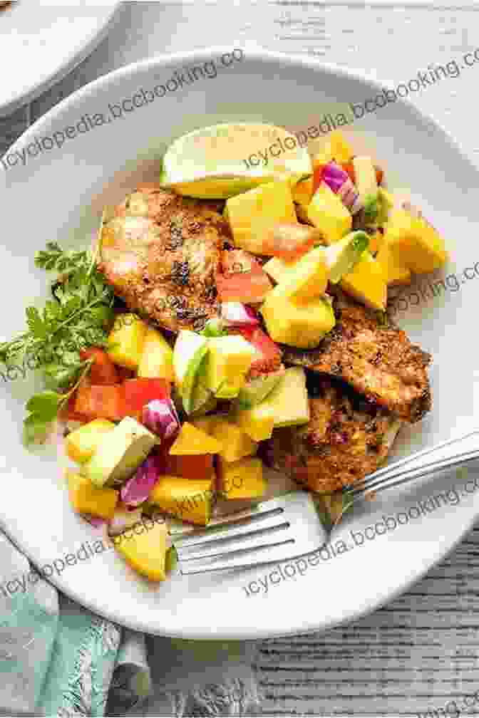 A Colorful Plate Of Jerk Chicken With Mango Salsa Yawd: Modern Afro Caribbean Recipes Adrian Forte