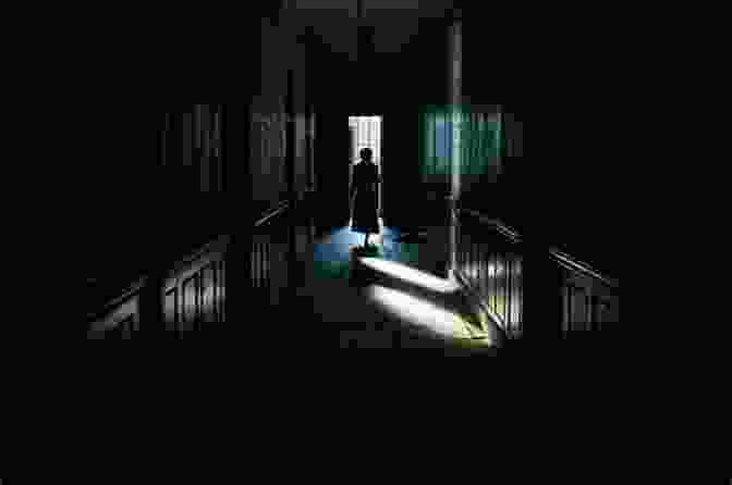 A Shadowy Figure Lurks In The Dimly Lit Hospital Hallway The Night Shift: A Novel