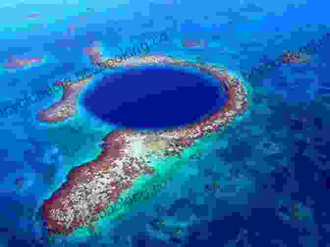 Aerial View Of The Blue Hole, An Underwater Sinkhole In Belize, Showcasing Its Deep, Blue Waters And Surrounding Coral Reefs. Island Time: Adventures Of A Traditional Wooden Sailboat In Belize