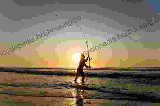An Angler Casting A Line Into The Surf, With A Beautiful Sunset In The Background The Complete Of Surf Fishing