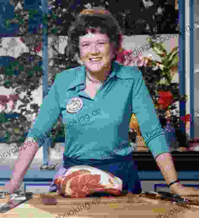 Julia Child Cooking On Her Television Show, 'The French Chef', Wearing A Blue And White Apron And A Chef's Hat. Born Hungry: Julia Child Becomes The French Chef
