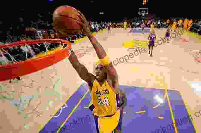 Kobe Bryant Dunking A Basketball, Looking Intense And Determined Kobe Bryant A D Largie