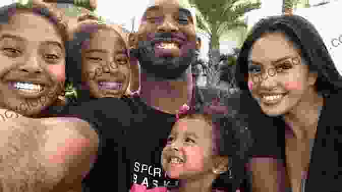 Kobe Bryant Embracing His Wife And Daughters, Smiling And Looking Happy Kobe Bryant A D Largie