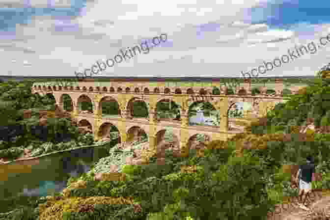 The Majestic Pont Du Gard, An Awe Inspiring Aqueduct That Spans The Gard River In Southern France, Its Three Tiers Of Arches Showcasing Roman Engineering Prowess. The Roman Remains Of Southern France: A Guide